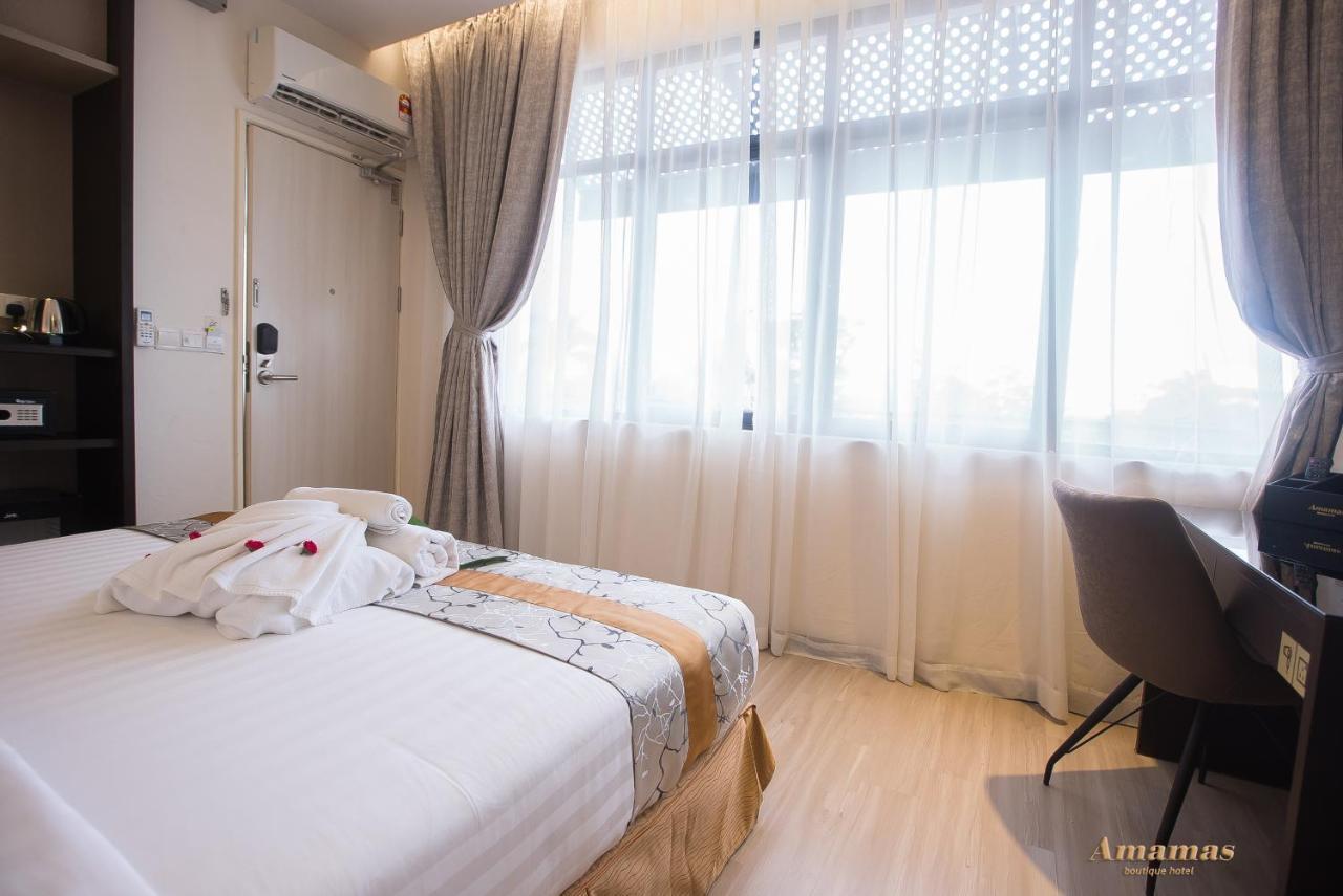 Amamas Boutique Hotel Kuching Exterior photo